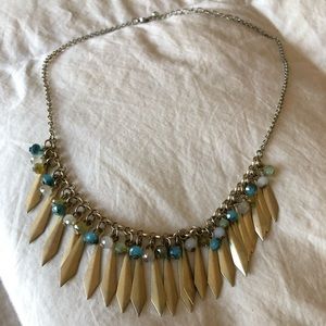 Gold necklace with blue tone crystals